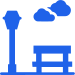 A blue icon of a park scene with a bench, a streetlamp, and two clouds in the sky. A blue icon of a park scene with a bench, a streetlamp, and two clouds in the sky.